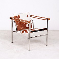 Show product details for Corbusier Style: Basculant Chair - Brown and White Pony Hide